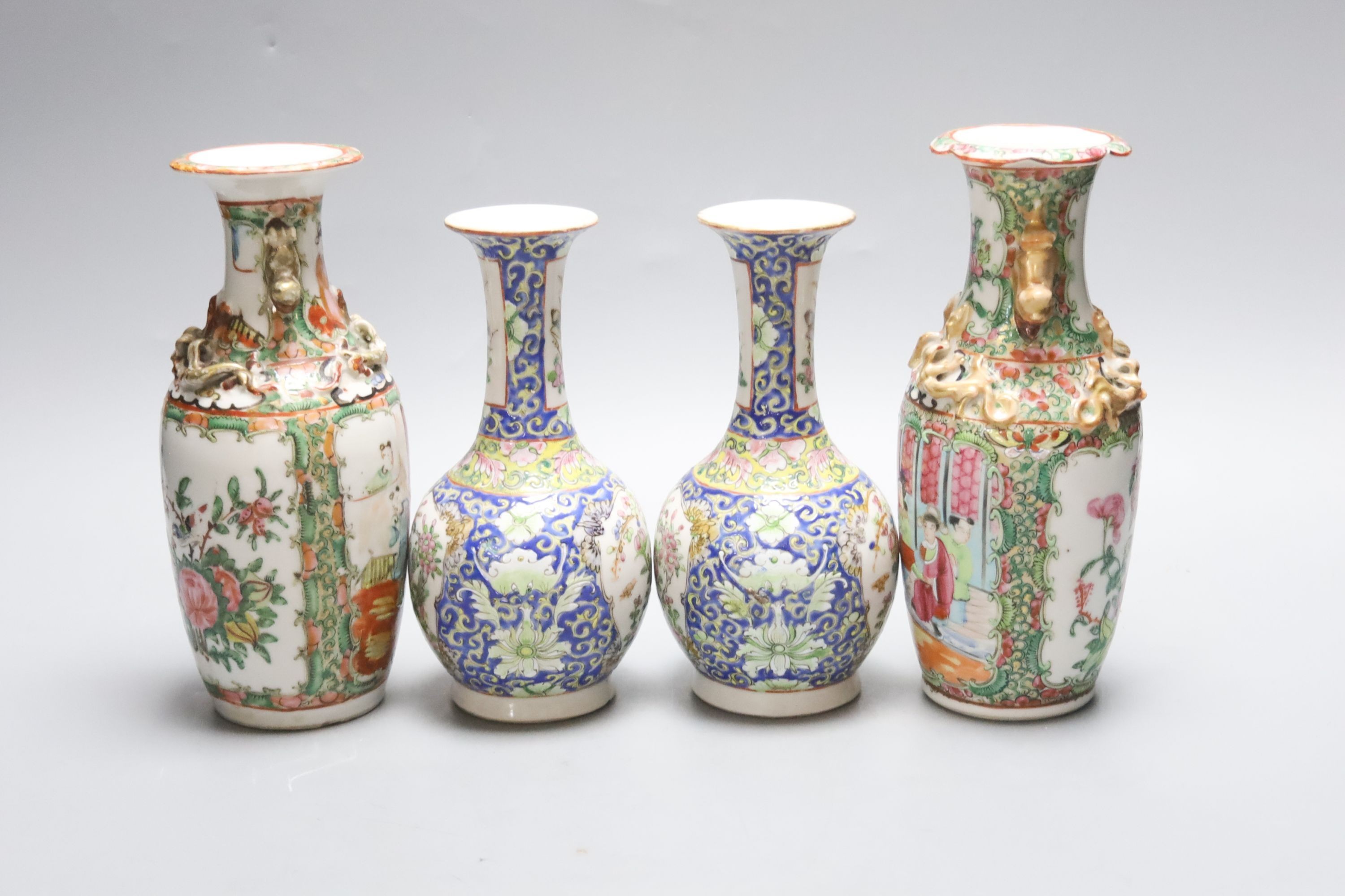 Four 19th century Chinese famille rose vases, 21cm